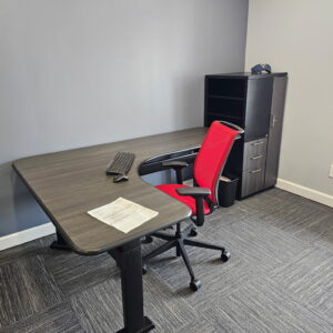 Steelcase height-adjustable table with personal tower